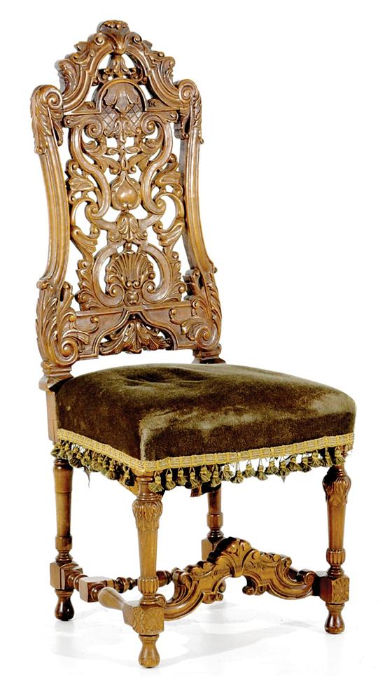 Appraisal: Two Continental carved walnut side chairs late th century pierce-carved