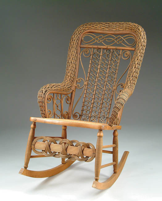 Appraisal: NATURAL FINISH WICKER ROCKER Rolled arm open back with vine