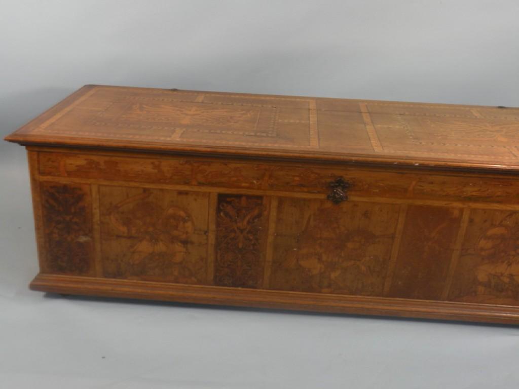 Appraisal: An thC German oak and marquetry chest the top inlaid