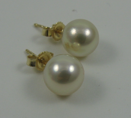 Appraisal: PAIR OF PEARL AND FOURTEEN KARAT GOLD EAR STUDS each