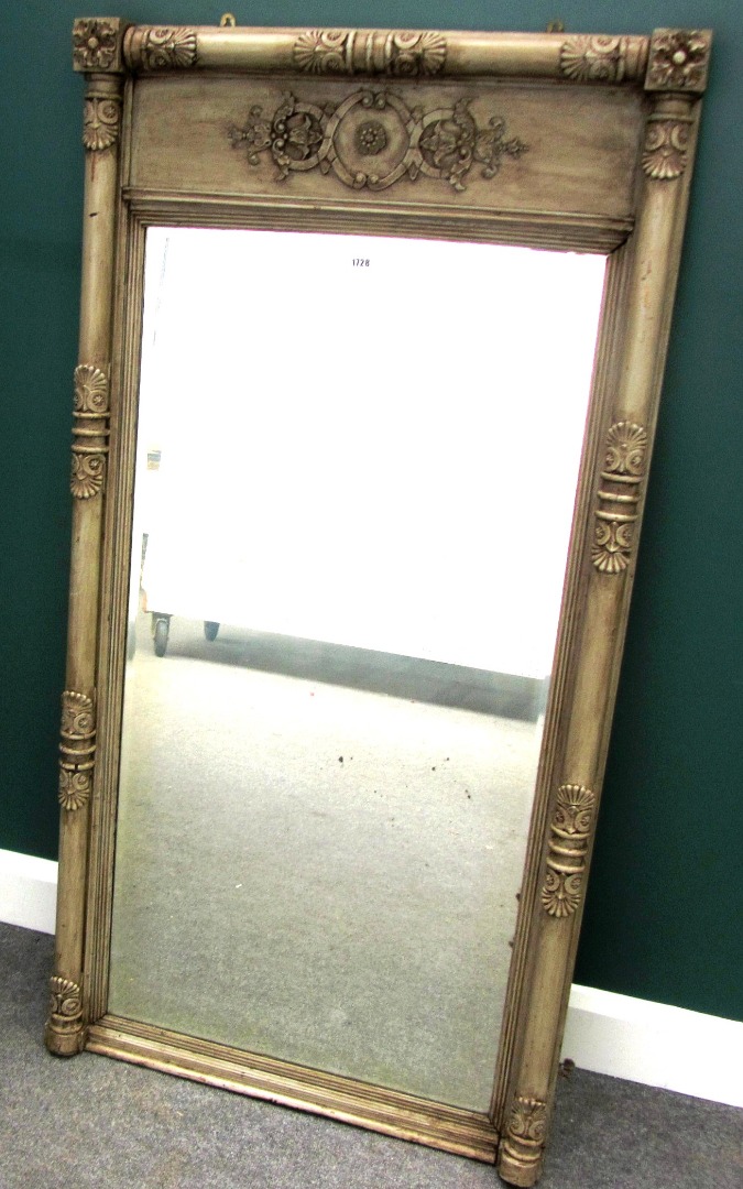 Appraisal: A William IV and later green painted wall mirror with