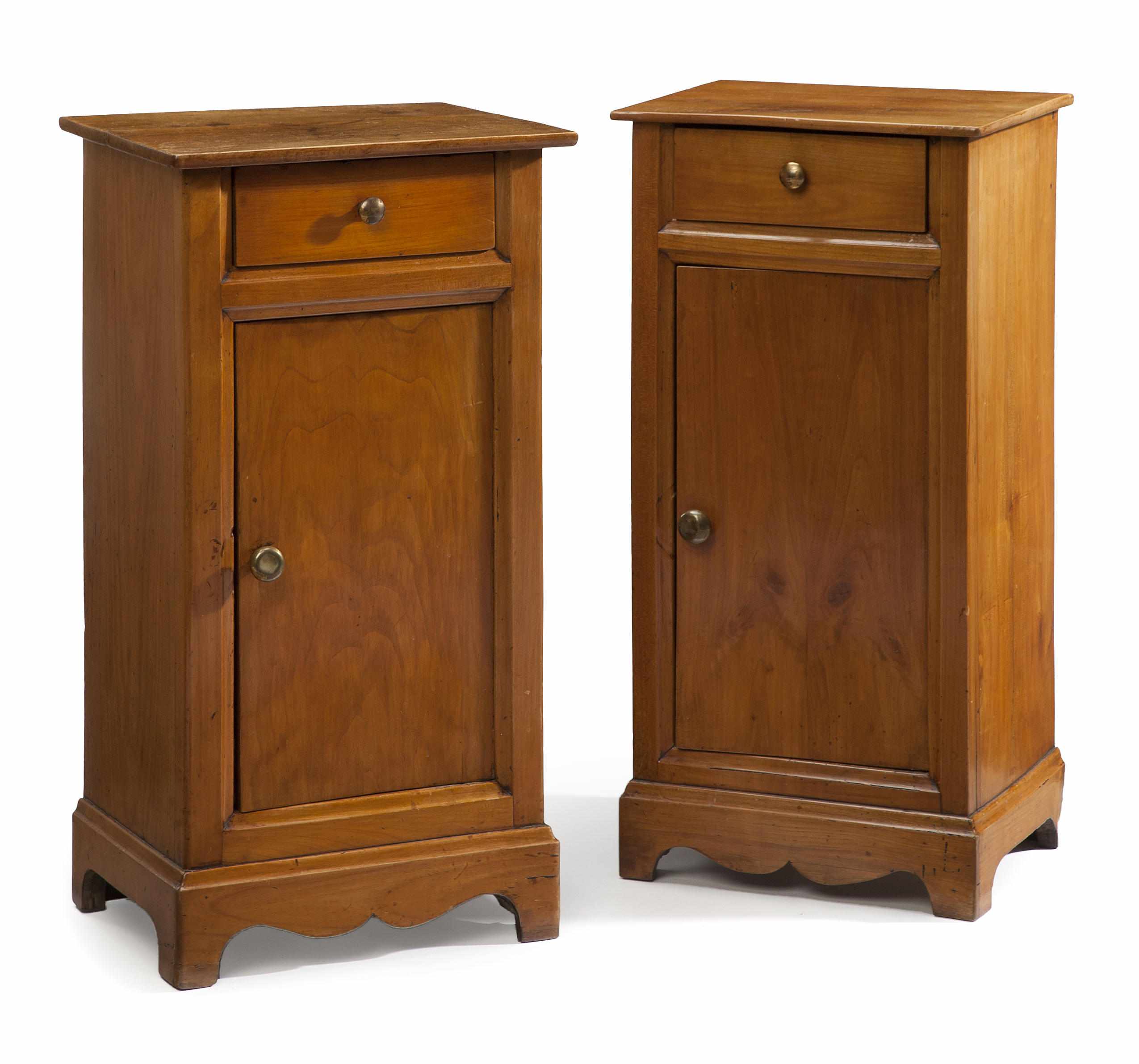 Appraisal: A pair of Continental Neoclassical style walnut bedside cupboards incorporating