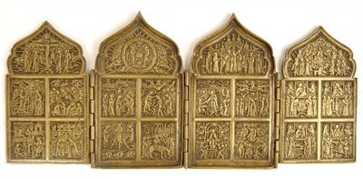 Appraisal: An orthodox brass folding icon having an ogee top above