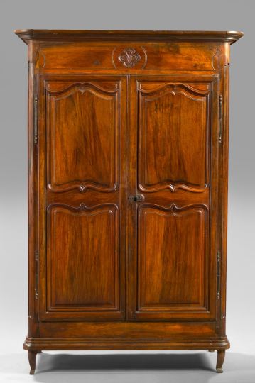 Appraisal: French Provincial Walnut Armoire late th century the rounded and