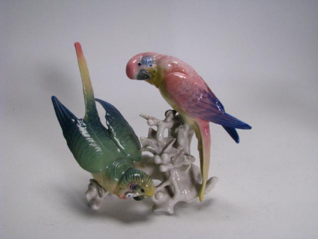 Appraisal: Early th century German figural porcelain grouping depicting parrots on