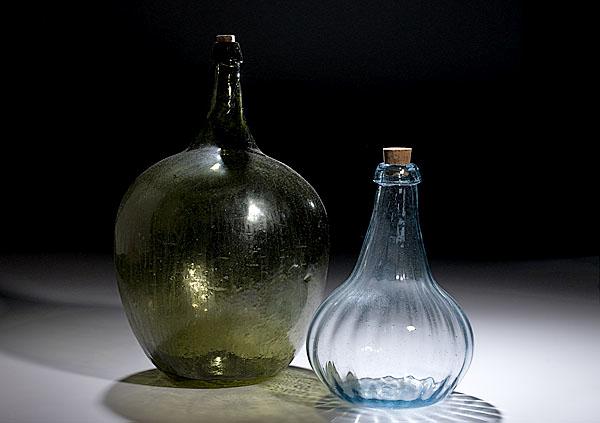 Appraisal: TWO BLOWN GLASS DEMIJOHNS American ca - possibly Ohio or