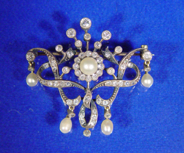 Appraisal: Edwardian gold pearl and diamond pendant brooch