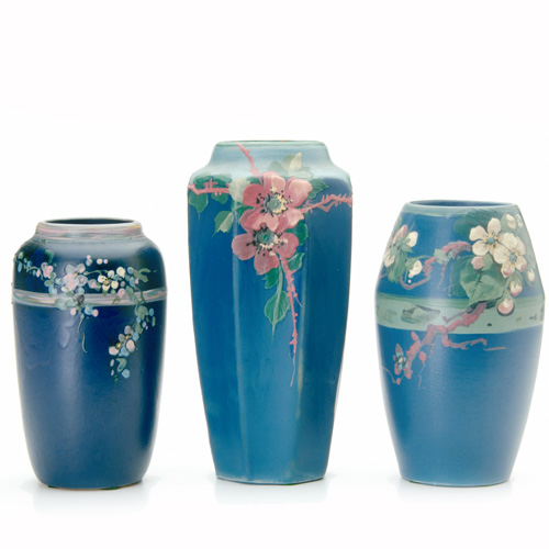 Appraisal: WELLER Three Blue and Decorated Hudson vases one faceted with