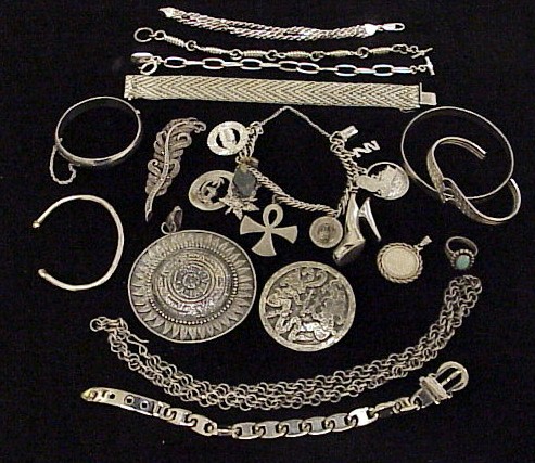 Appraisal: JEWELRY Silver including mesh bangle and chain bracelets including a