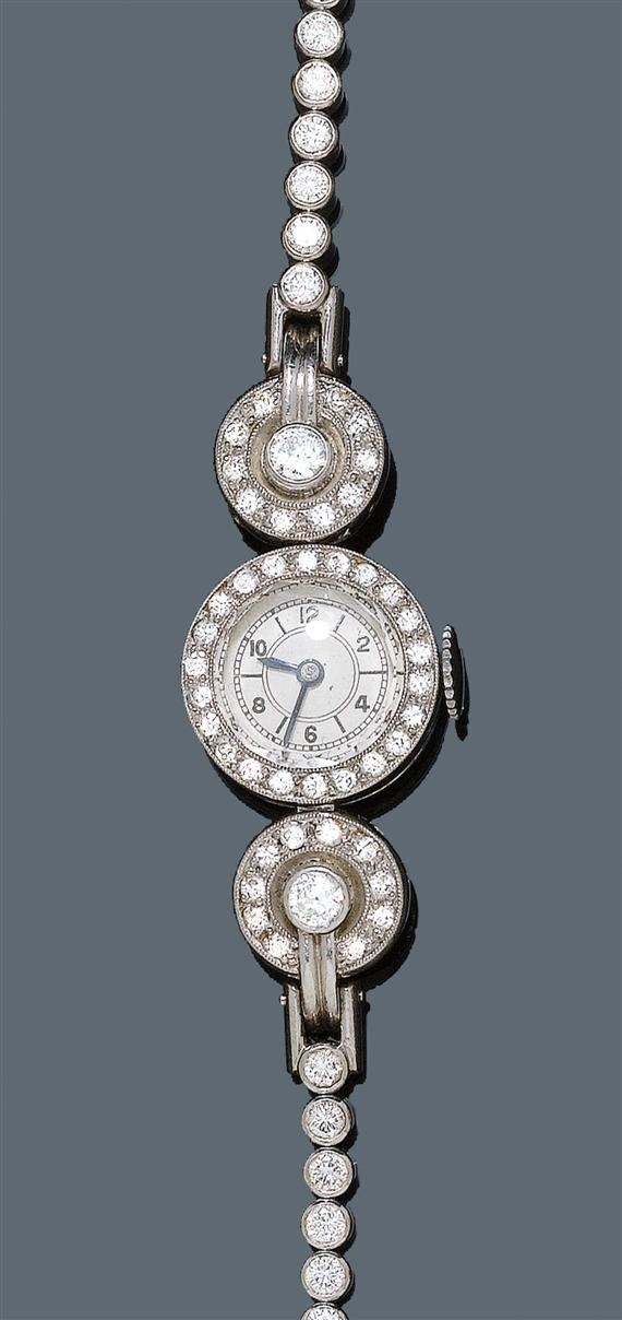 Appraisal: DIAMOND LADY'S WRISTWATCH ca Platinum and white gold Small round