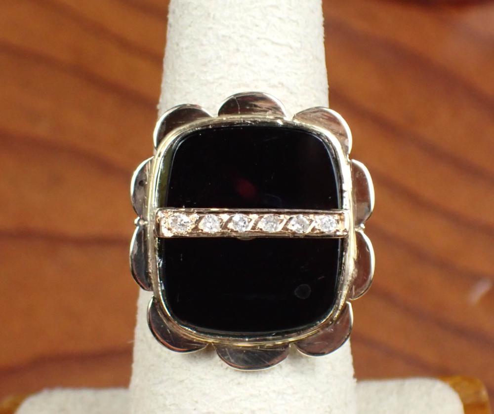 Appraisal: DIAMOND BLACK ONYX AND FOURTEEN KARAT GOLD RING with a