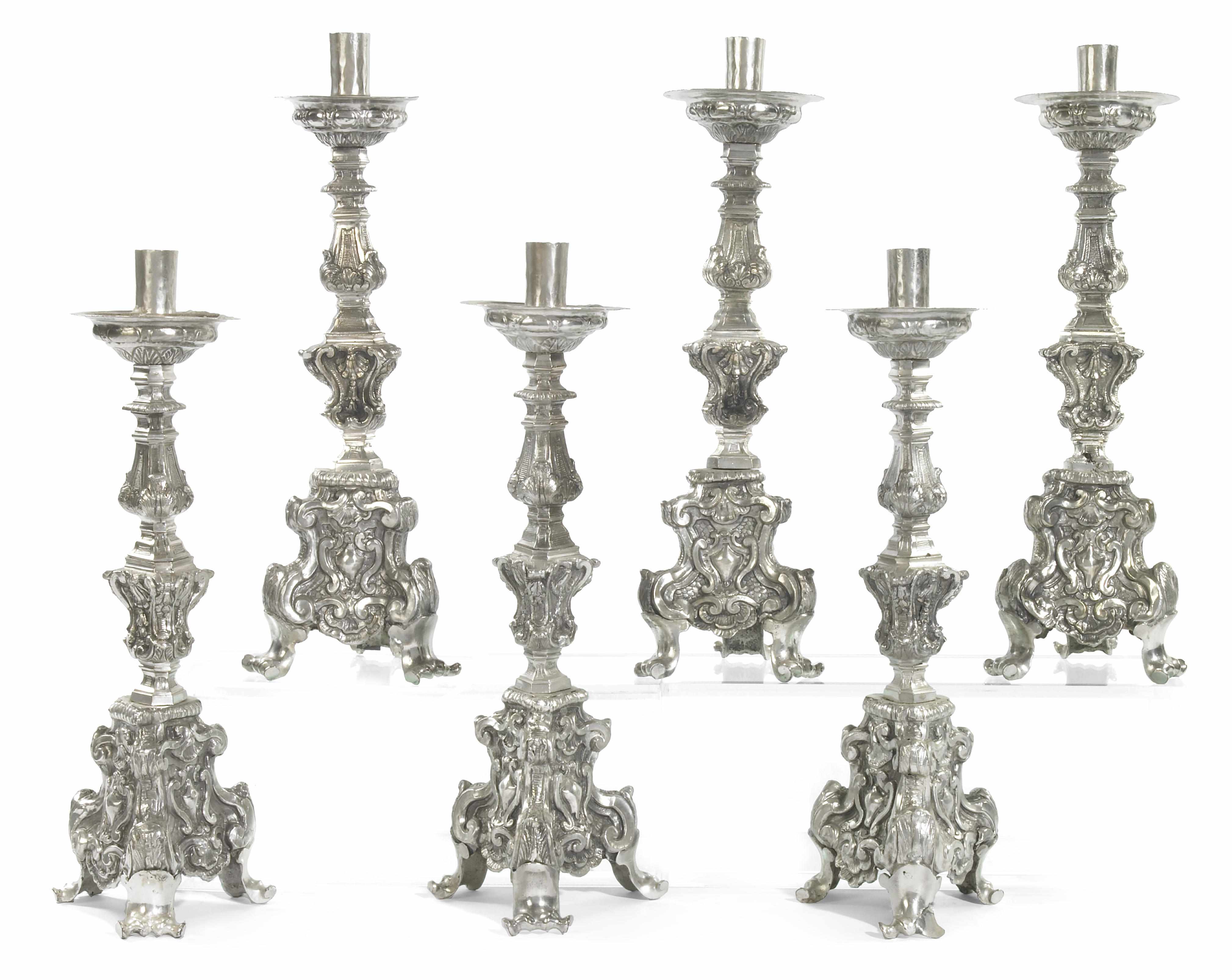 Appraisal: A set of six Baroque style silvered metal candlesticks th