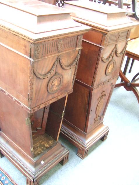 Appraisal: A pair of th century mahogany dining room pedestals each