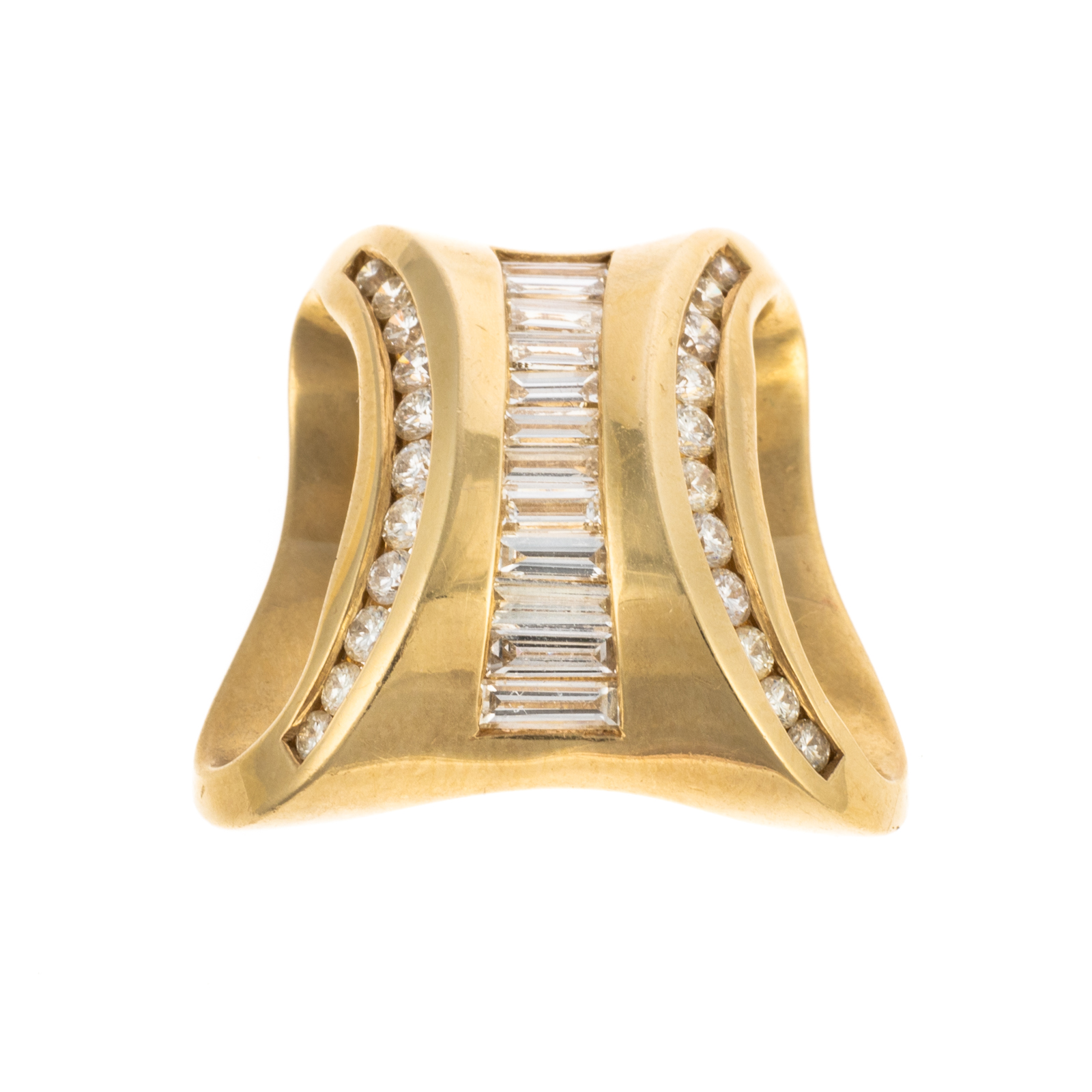 Appraisal: A BAGUETTE DIAMOND RIBBON SLIDE IN K K yellow gold