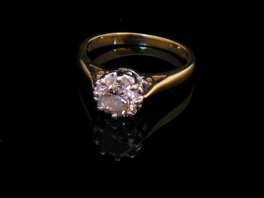 Appraisal: A DIAMOND SOLITAIRE RING the central round-cut diamond c cts