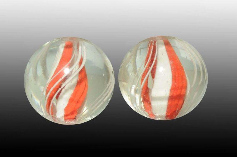 Appraisal: Lot of Divided Ribbon Core Marbles Description Same cane Unique