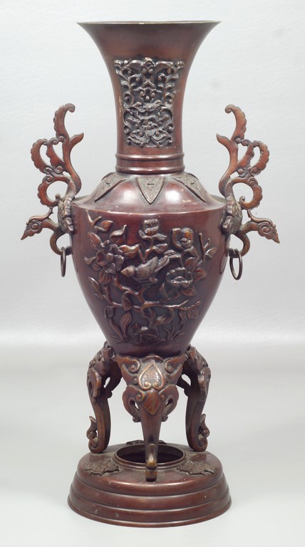 Appraisal: Japanese bronze urn on round base pierced handles bird and