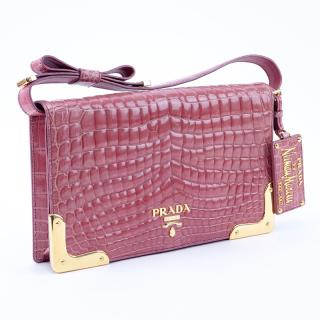 Appraisal: Prada Limited Edition Pink Crocodile Clutch Gold tone hardware Leather