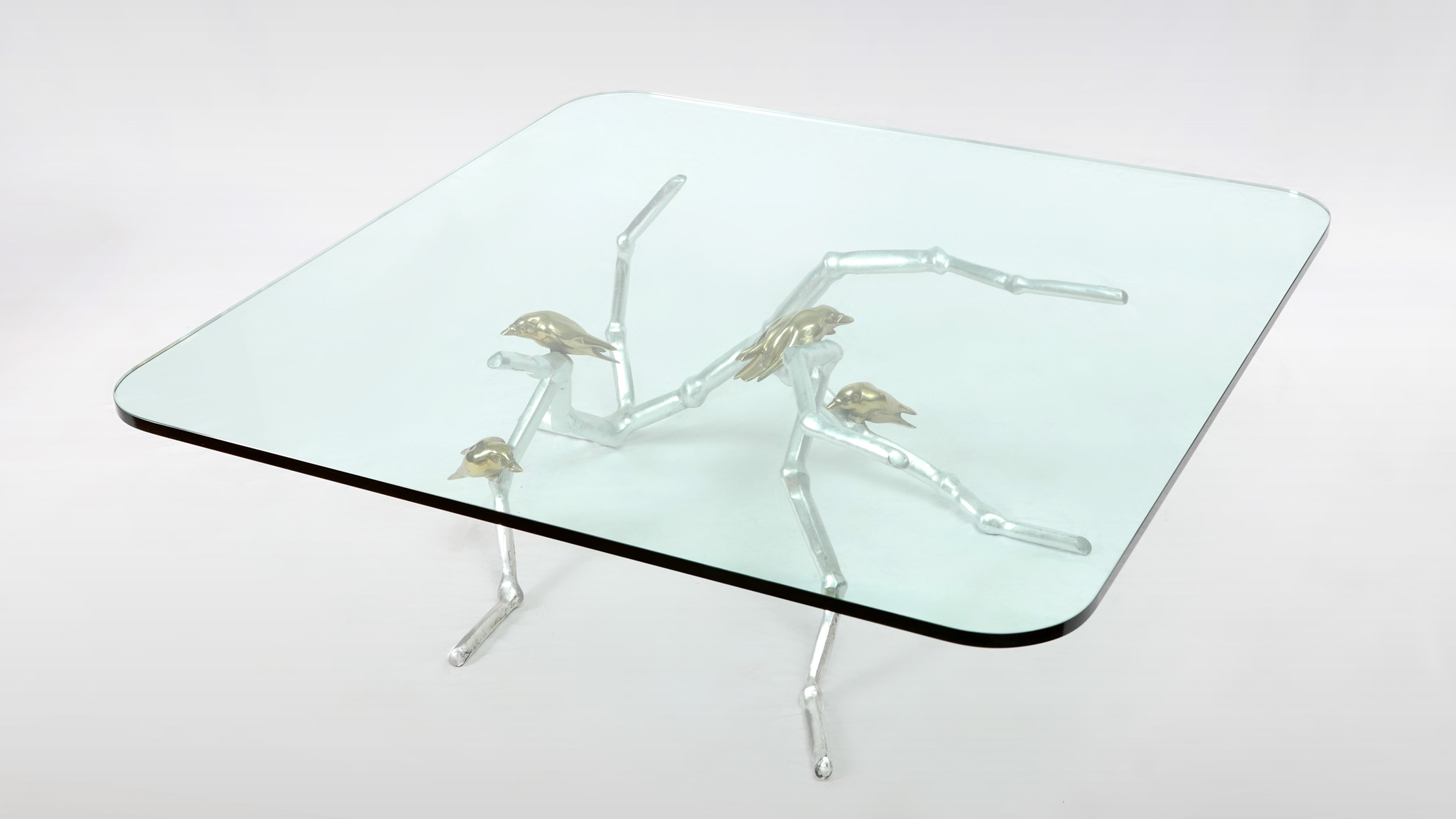 Appraisal: CHRISTIAN TECHOUEYRES BRONZE SILVER OVERLAY COFFEE TABLE Silver overlayed bronze