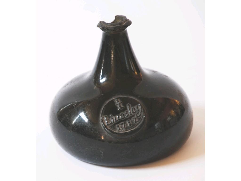 Appraisal: LIVESLEY' EARLY TH CENTURY GREEN GLASS WINE BOTTLE compressed onion