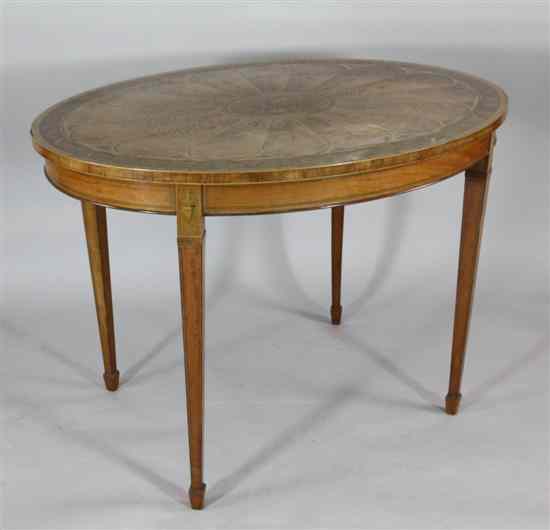 Appraisal: A George III style satinwood mahogany and marquetry oval centre