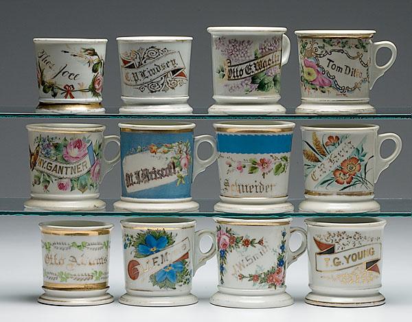 Appraisal: LOT OF TWELVE FLORAL SHAVING MUGS with gilt names Includes