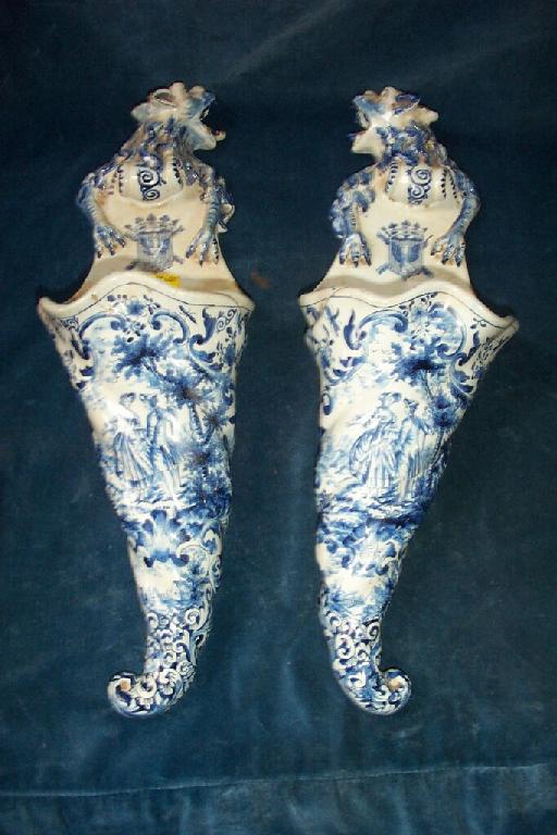 Appraisal: A pair of th century continental tin glazed earthenware wall