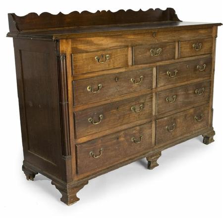 Appraisal: A large and unusual George III mahogany kitchen dresser housekeeper's