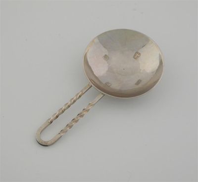 Appraisal: A contemporary spoon with hammered circular bowl looped wire stem