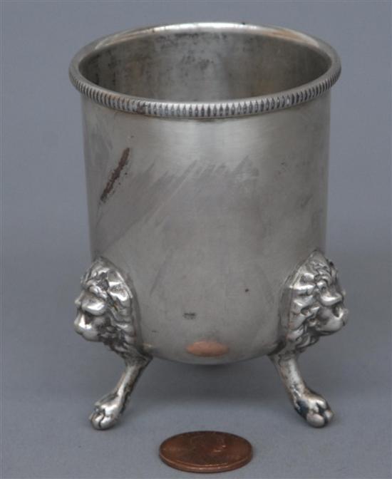 Appraisal: A STERLING SILVER FOOTED VASE WITH LION HEAD FEET H