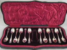 Appraisal: A dozen silver King's shape and shell teaspoons with tongs