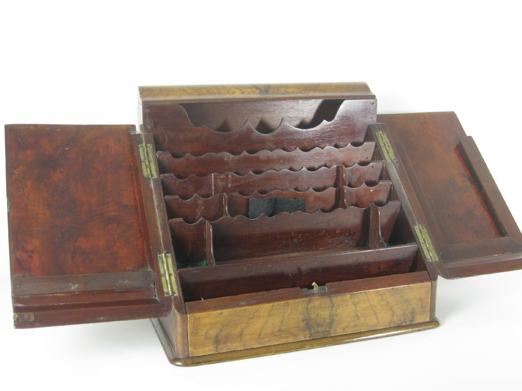 Appraisal: A Victorian walnut Stationary Box with pair of sloping doors