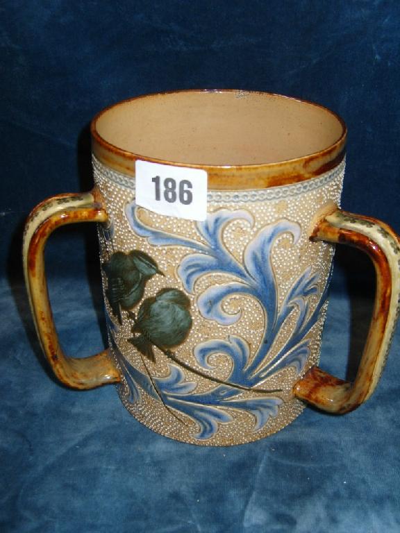 Appraisal: A Doulton Lambeth quart capacity -handled tyg with incised bird