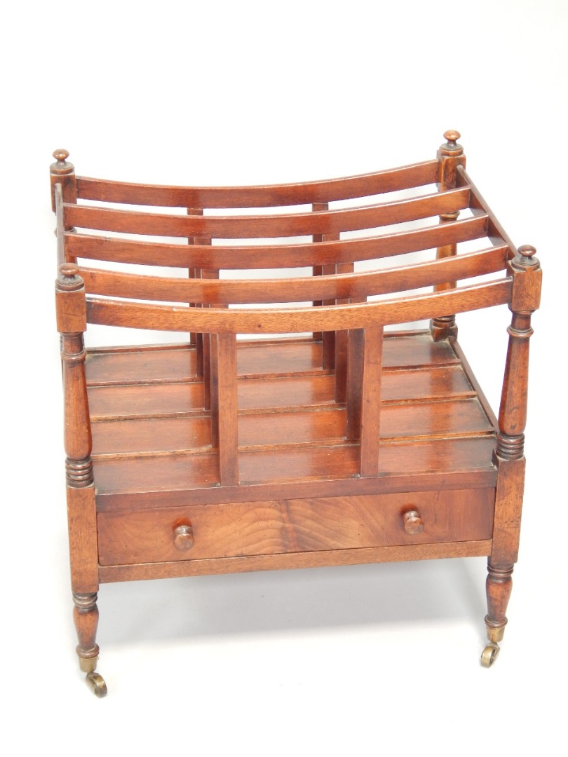 Appraisal: A Regency mahogany Canterbury of boat style having four individual