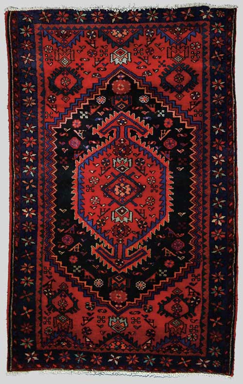 Appraisal: ORIENTAL HAMADAN SCATTER RUG Vivid colors of red blue and