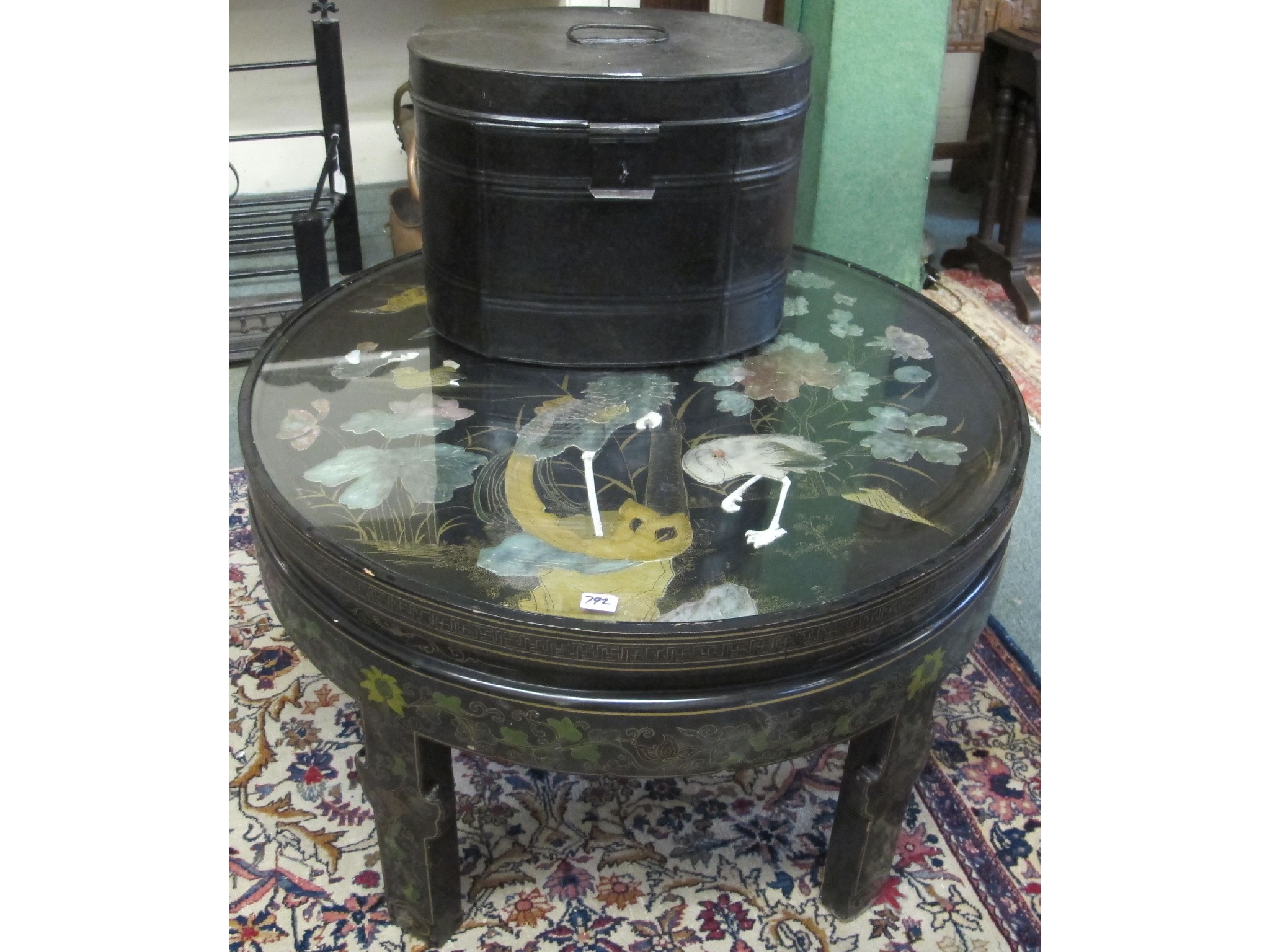 Appraisal: A Chinese black lacquered glass topped table and a black