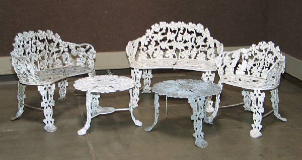 Appraisal: A suite of white painted cast metal garden furniture comprising