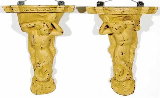 Appraisal: Pair Continental carved wood figural brackets th century shaped and