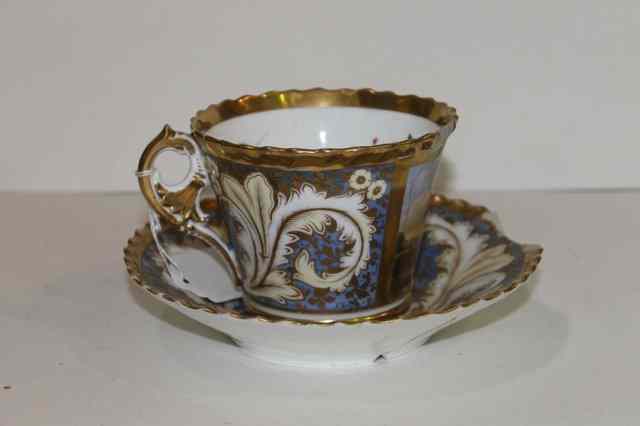 Appraisal: A CHAMBERLAINS WORCESTER TOPOGRAPHICAL CABINET CUP and saucer circa painted