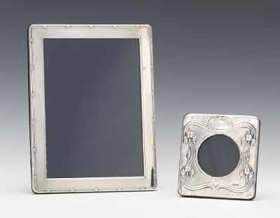 Appraisal: Two Sterling Silver Repousse Picture Frames Each with Birmingham marks