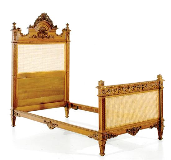 Appraisal: Napoleon III style carved walnut and cane bed late th