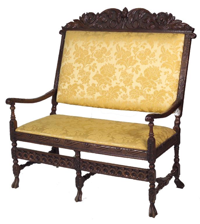 Appraisal: CAROLEAN STYLE OAK AND WALNUT SETTEE the padded back with