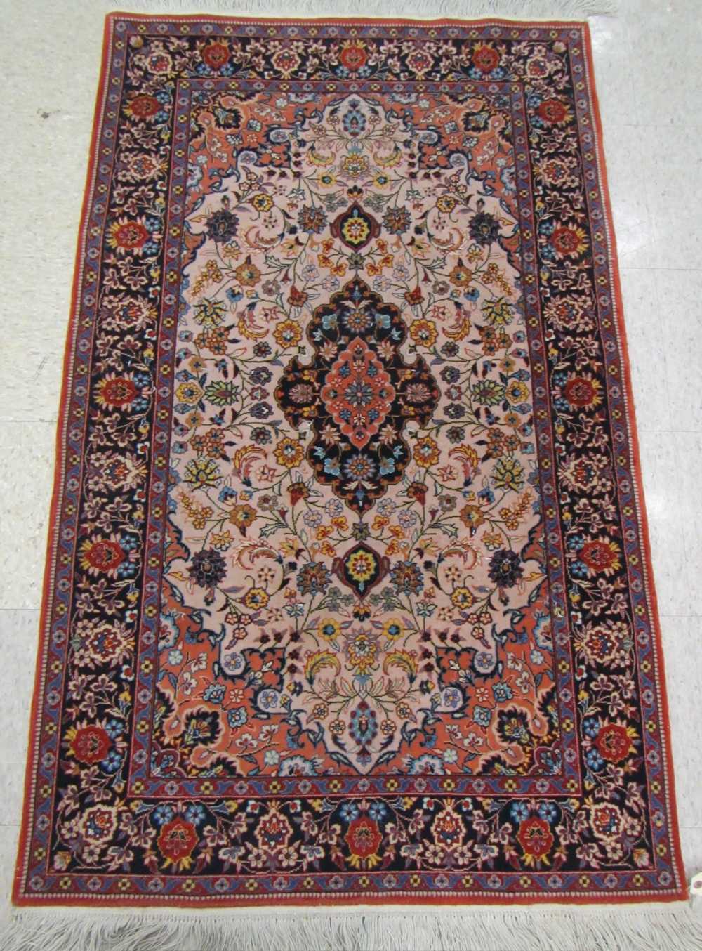 Appraisal: PERSIAN AREA RUG floral and central floral medallion design hand