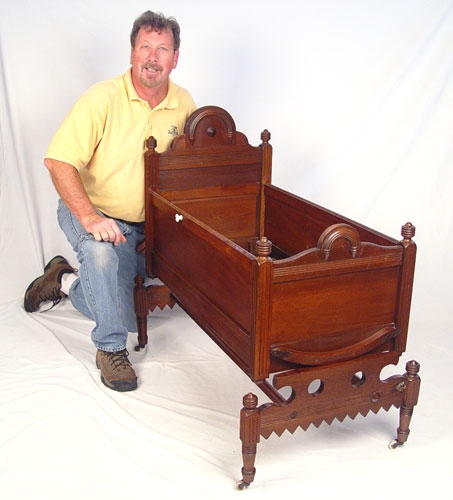 Appraisal: VICTORIAN WALNUT ROCKER CRADLE Cradle is removable from rocker Measures