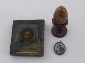 Appraisal: A painted icon of a Saint with metal riza x