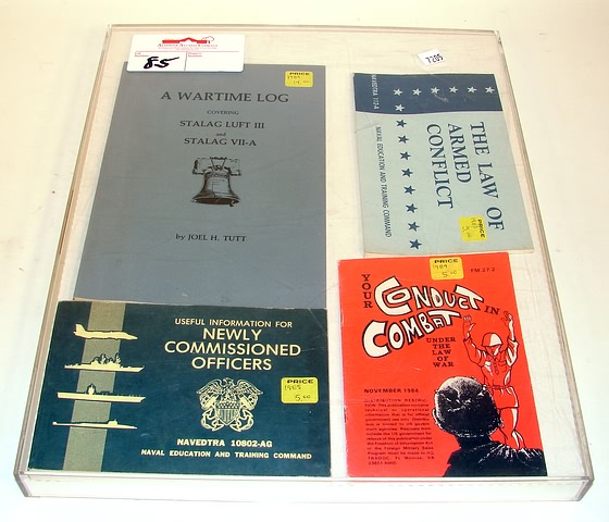 Appraisal: Framed lot of four military related pamphlets