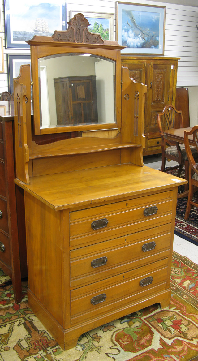 Appraisal: SATINWOOD DRESSER WITH MIRROR English early th century the rectangular