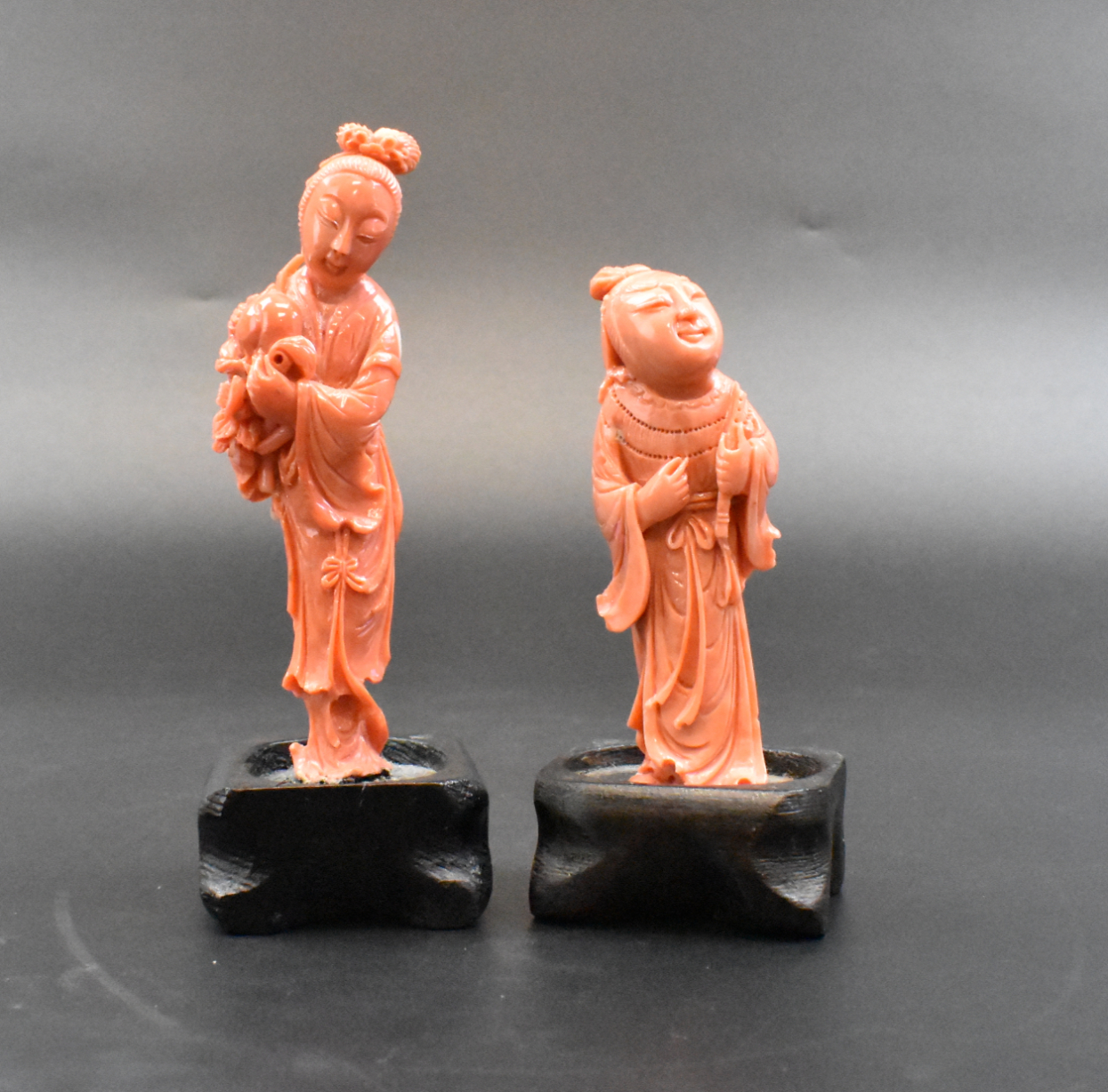 Appraisal: two Chinese coral figures one male one female both wearing