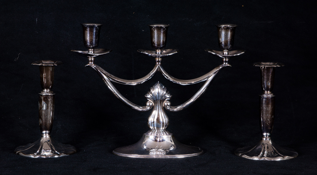 Appraisal: A FINNISH SILVER WEIGHTED CANDELABRA AND PAIR OF CANDLESTICKS A