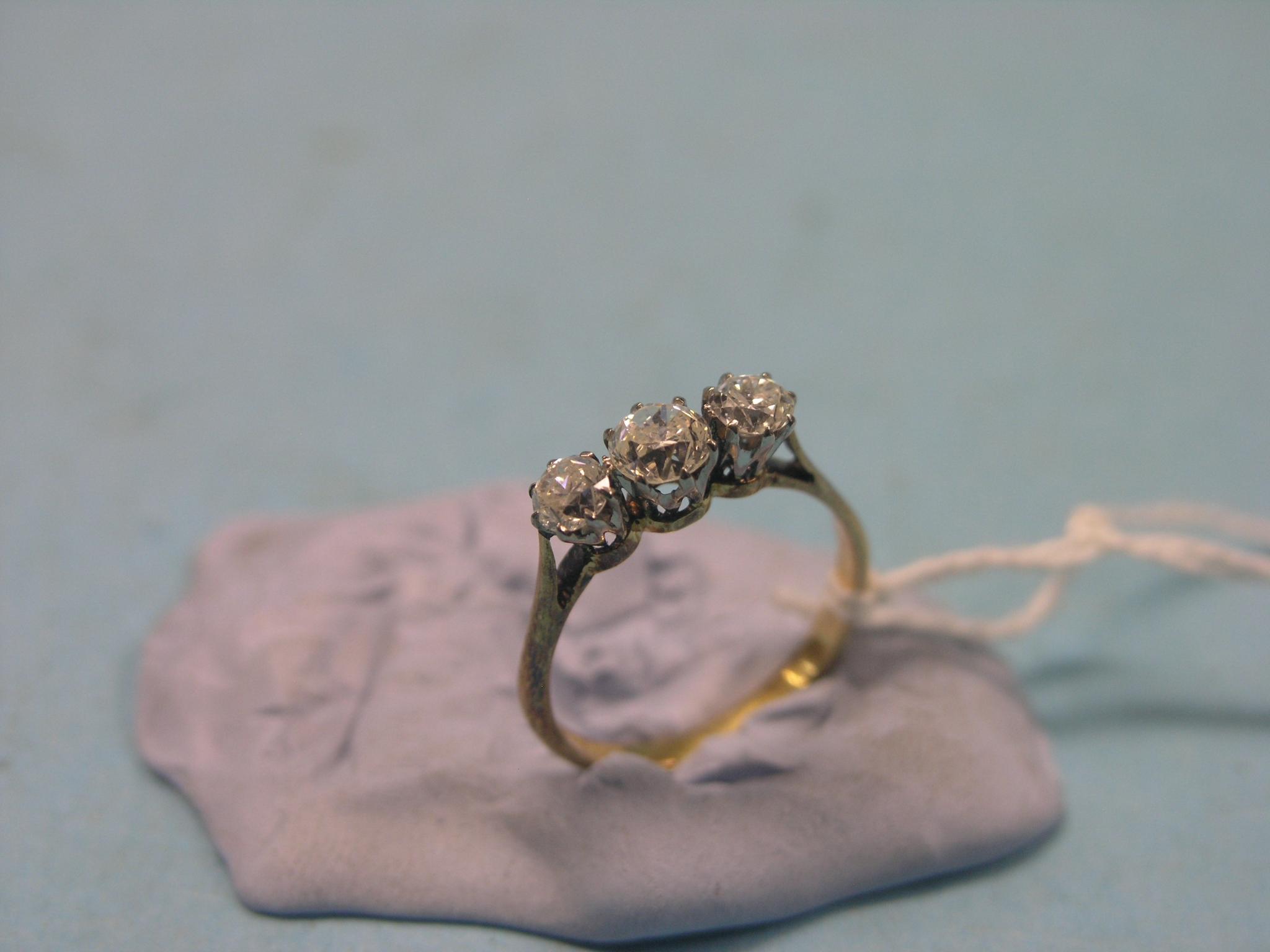 Appraisal: An ct gold and diamond half-hoop ring three diamonds platinum